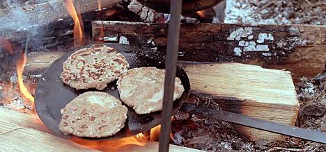 Viking bread cooking on the fire